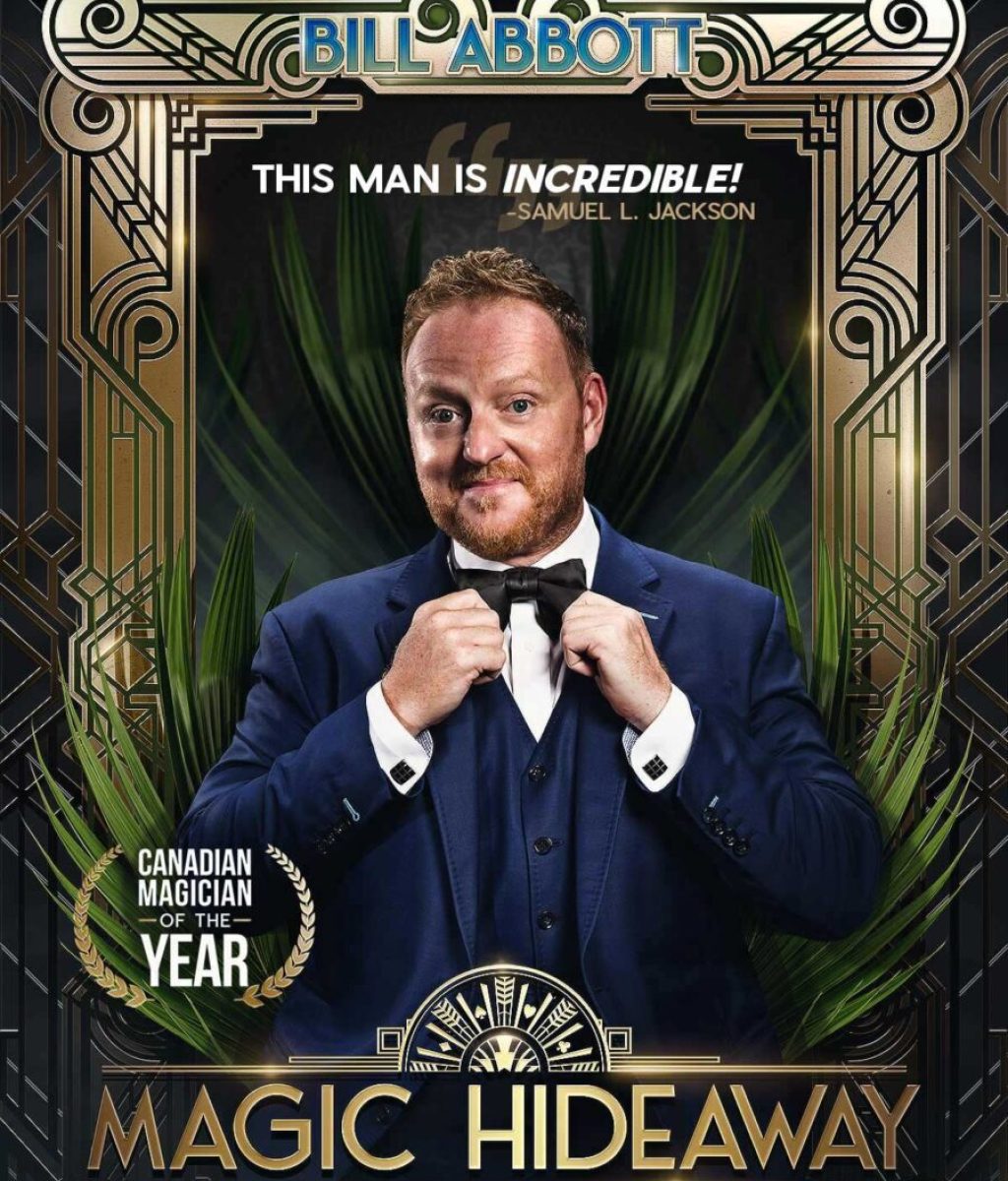 Bill Abbott Magician in blue tuxedo, gold frame, Magic Hideaway logo in gold